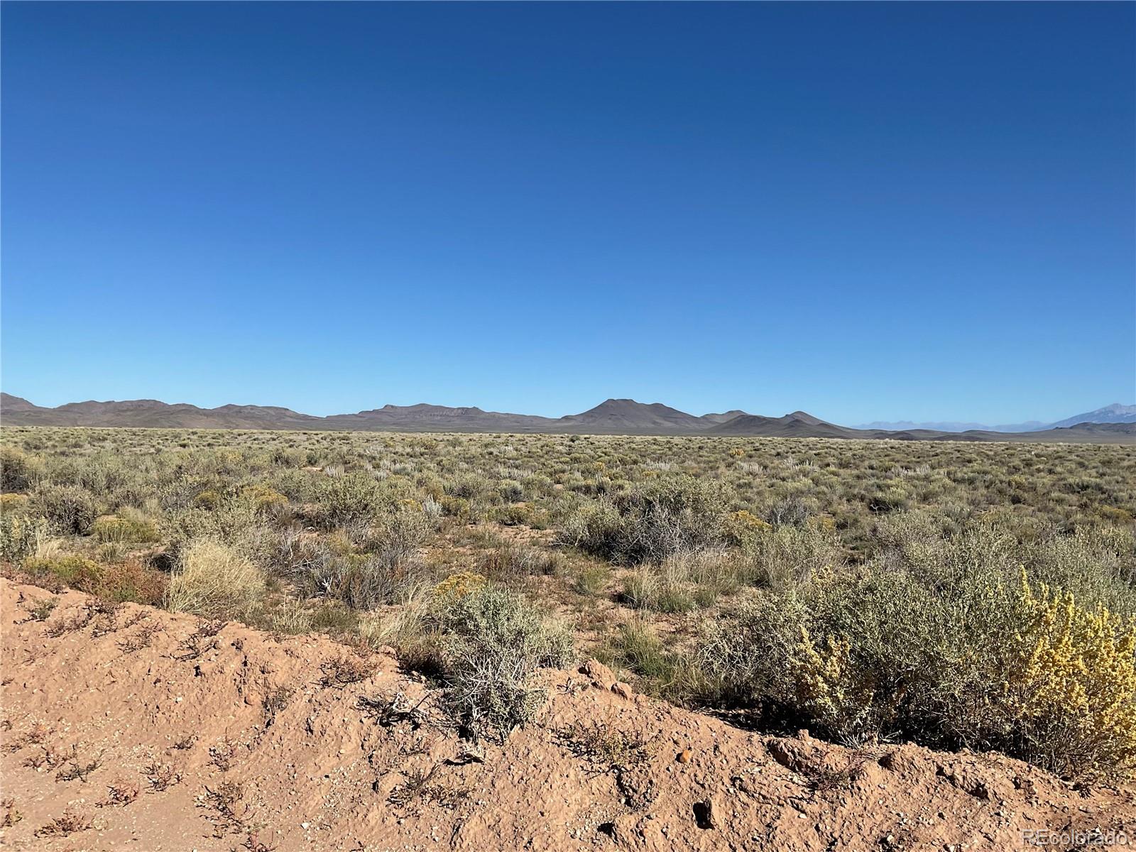 Lot 2 Ben Road Sanford, CO 81151 - Photo 6 of 9 a view of a large mountain with mountains in the background