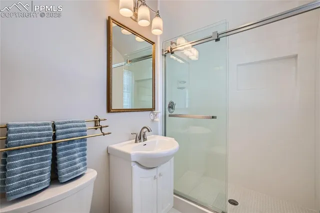 a bathroom with a sink and mirror