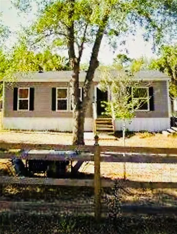 a view of house with ocean view