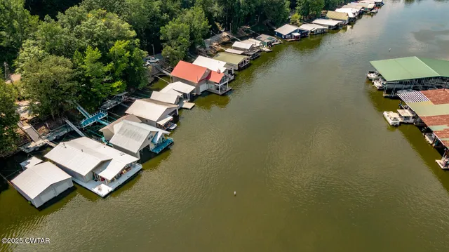 a front view of a house with swimming pool