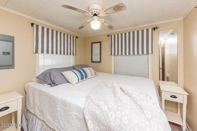 an aerial view of a house with a lake view