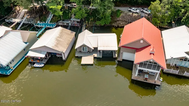 a view of swimming pool with lounge chair