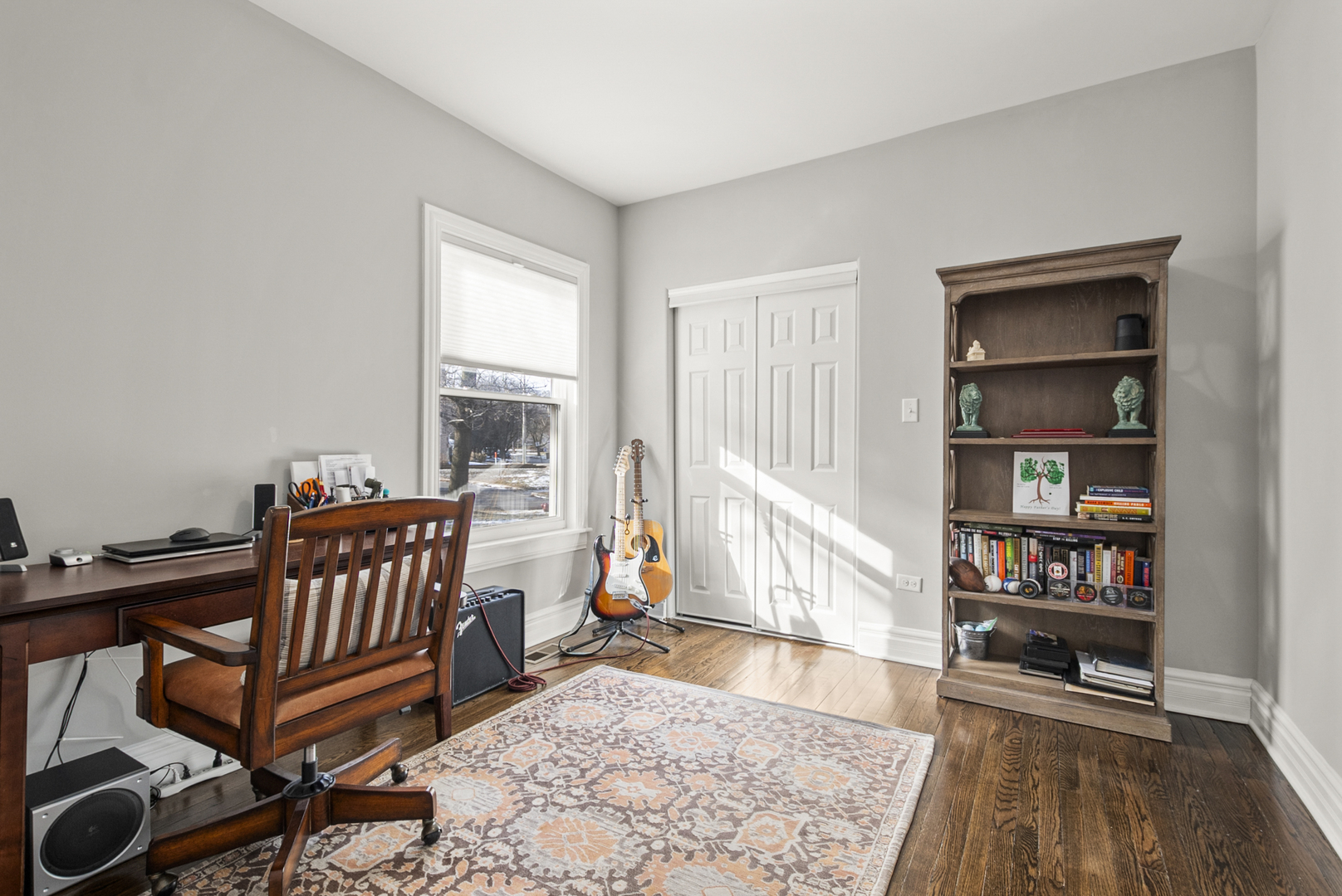 1885 West 108th Place Chicago, IL 60643 - Photo 12 of 31 a living room with furniture and a book shelf