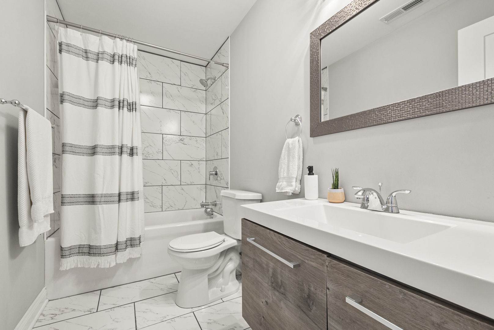 1885 West 108th Place Chicago, IL 60643 - Photo 17 of 31 a bathroom with a sink a toilet and shower