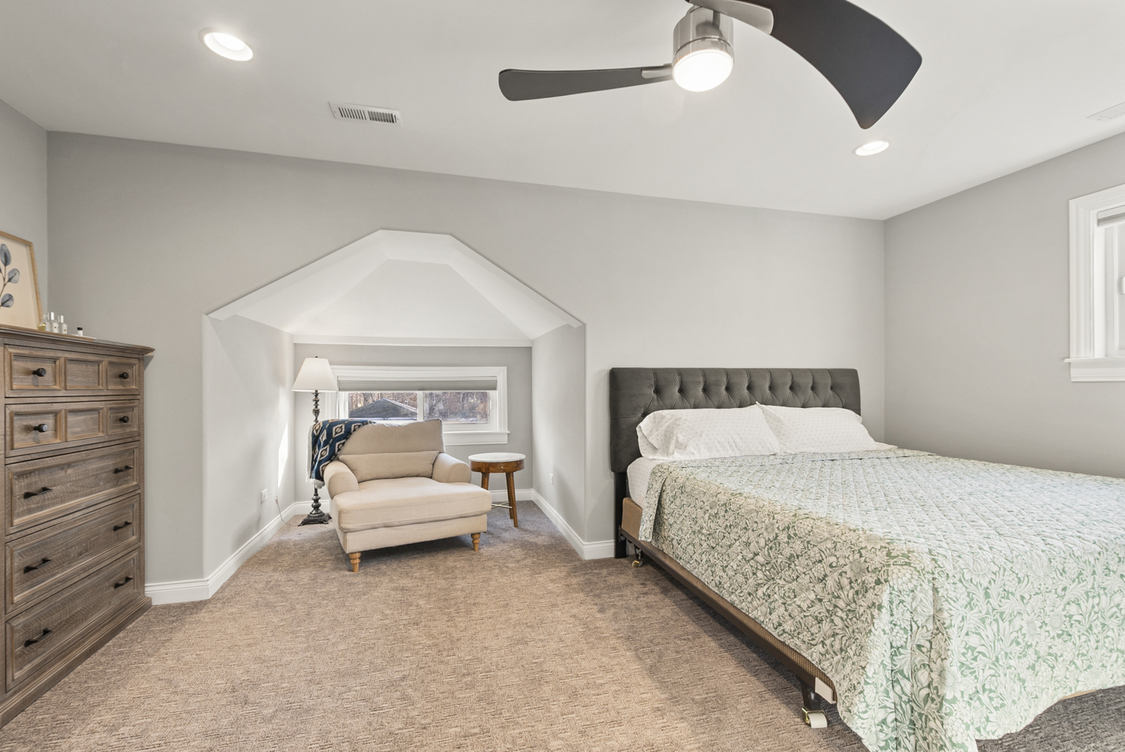 1885 West 108th Place Chicago, IL 60643 - Photo 18 of 31 a spacious bedroom with a bed and ceiling fan