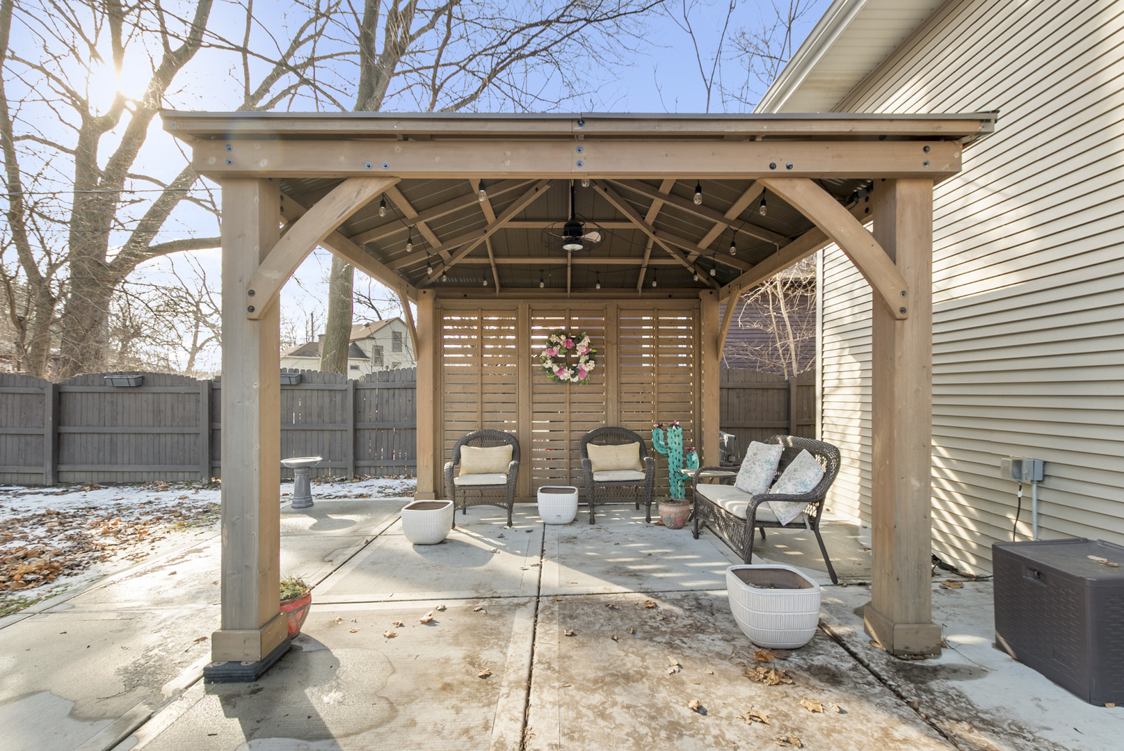1885 West 108th Place Chicago, IL 60643 - Photo 27 of 31 a view of a patio with table and chairs and wooden floor