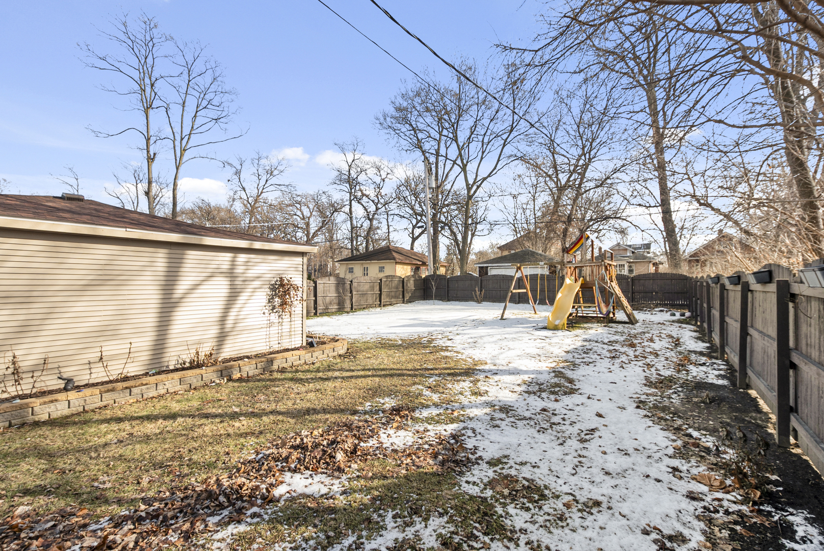 1885 West 108th Place Chicago, IL 60643 - Photo 29 of 31 a view of a yard with snow on the road