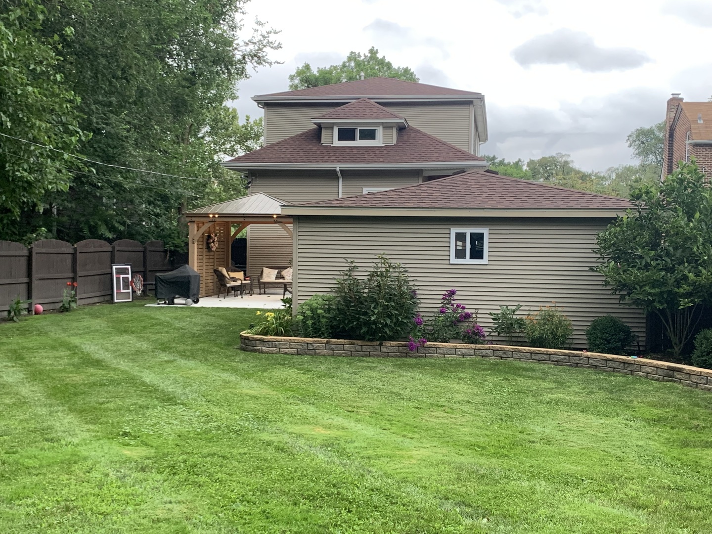 1885 West 108th Place Chicago, IL 60643 - Photo 31 of 31 a front view of a house with garden