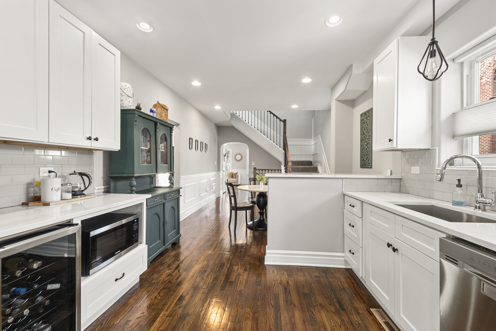 1885 West 108th Place Chicago, IL 60643 - Photo 8 of 31 a kitchen with a sink a counter top space stainless steel appliances and cabinets