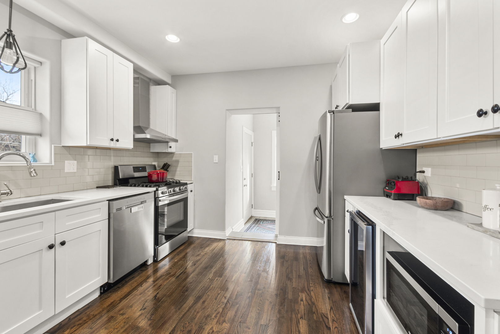 1885 West 108th Place Chicago, IL 60643 - Photo 10 of 31 a kitchen with granite countertop a sink cabinets and stainless steel appliances