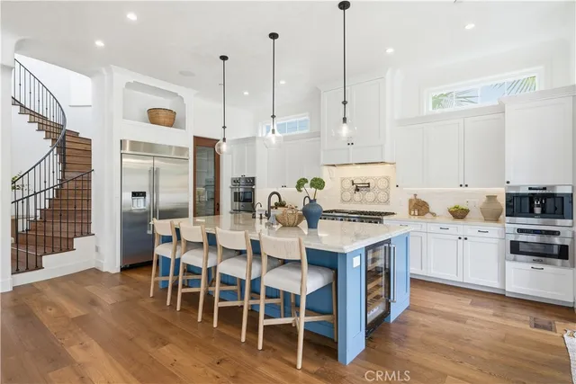 a bathroom with a double vanity sink and mirror