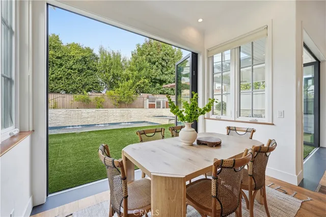 a bathroom with a granite countertop sink mirror and double