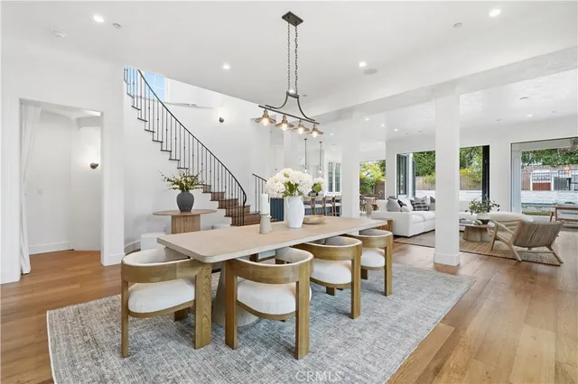 a spacious bedroom with a bed and a window