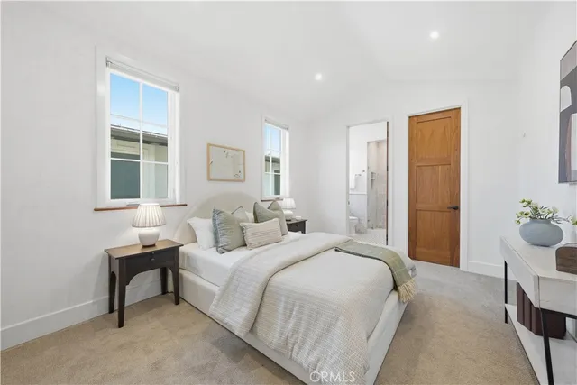 a building outdoor space with patio furniture and garden