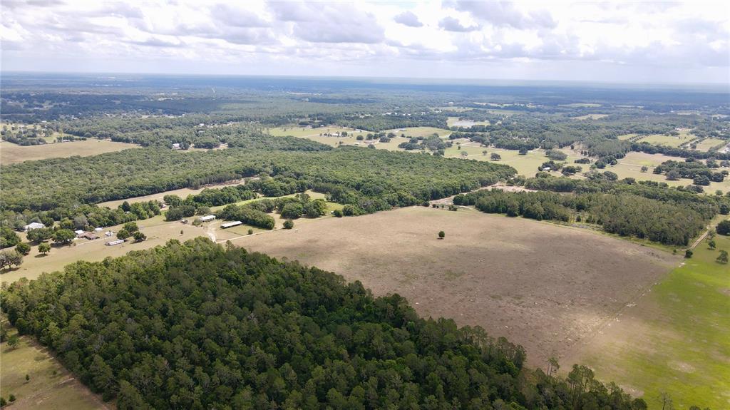 Parrish Grove Road Dade City, FL 33523 - Photo 16 of 23 an aerial view of a houses with city view