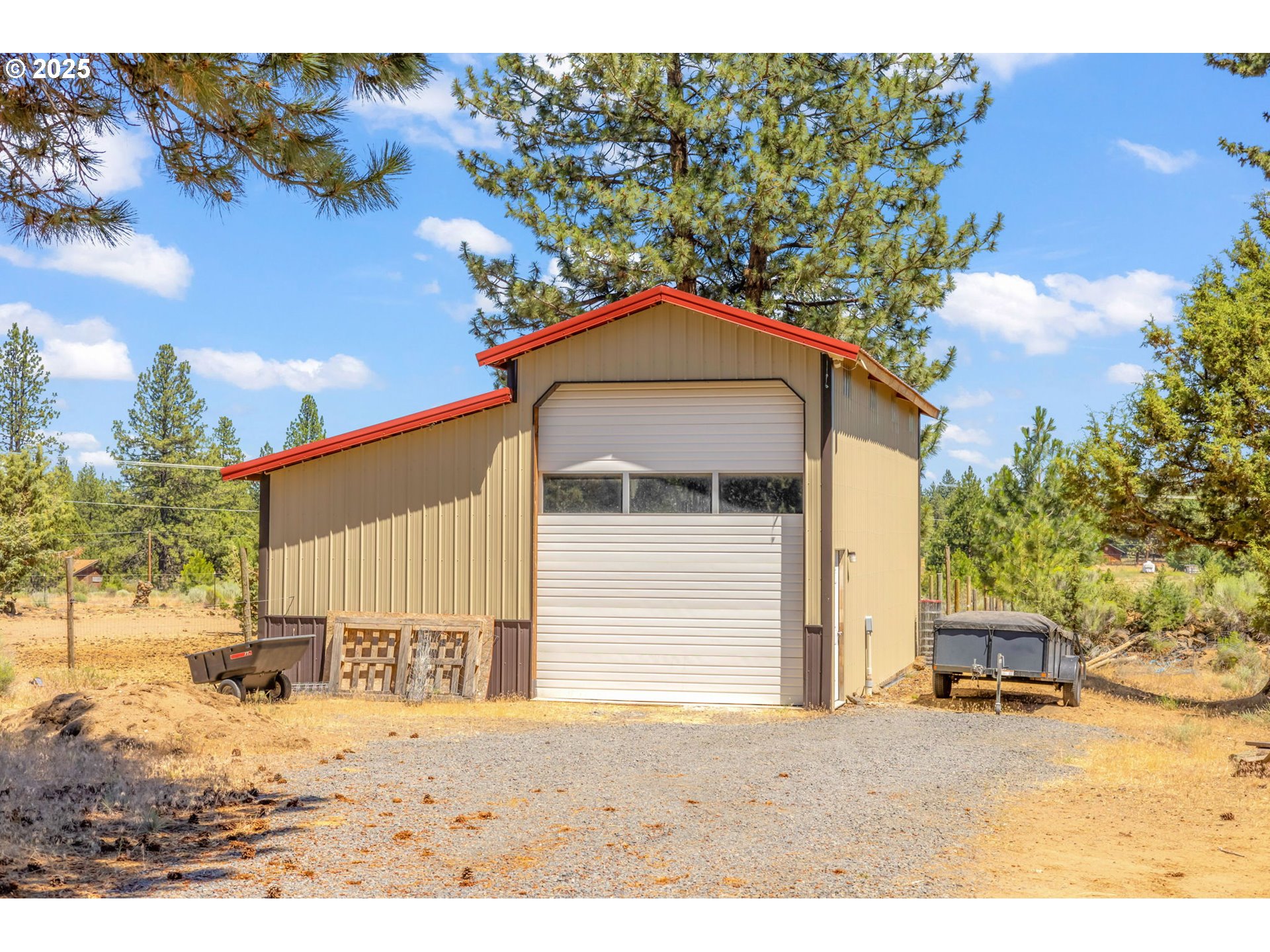 19723 Buck Canyon Road Bend, OR 97702 - Photo 36 of 48 a front view of a house with a yard