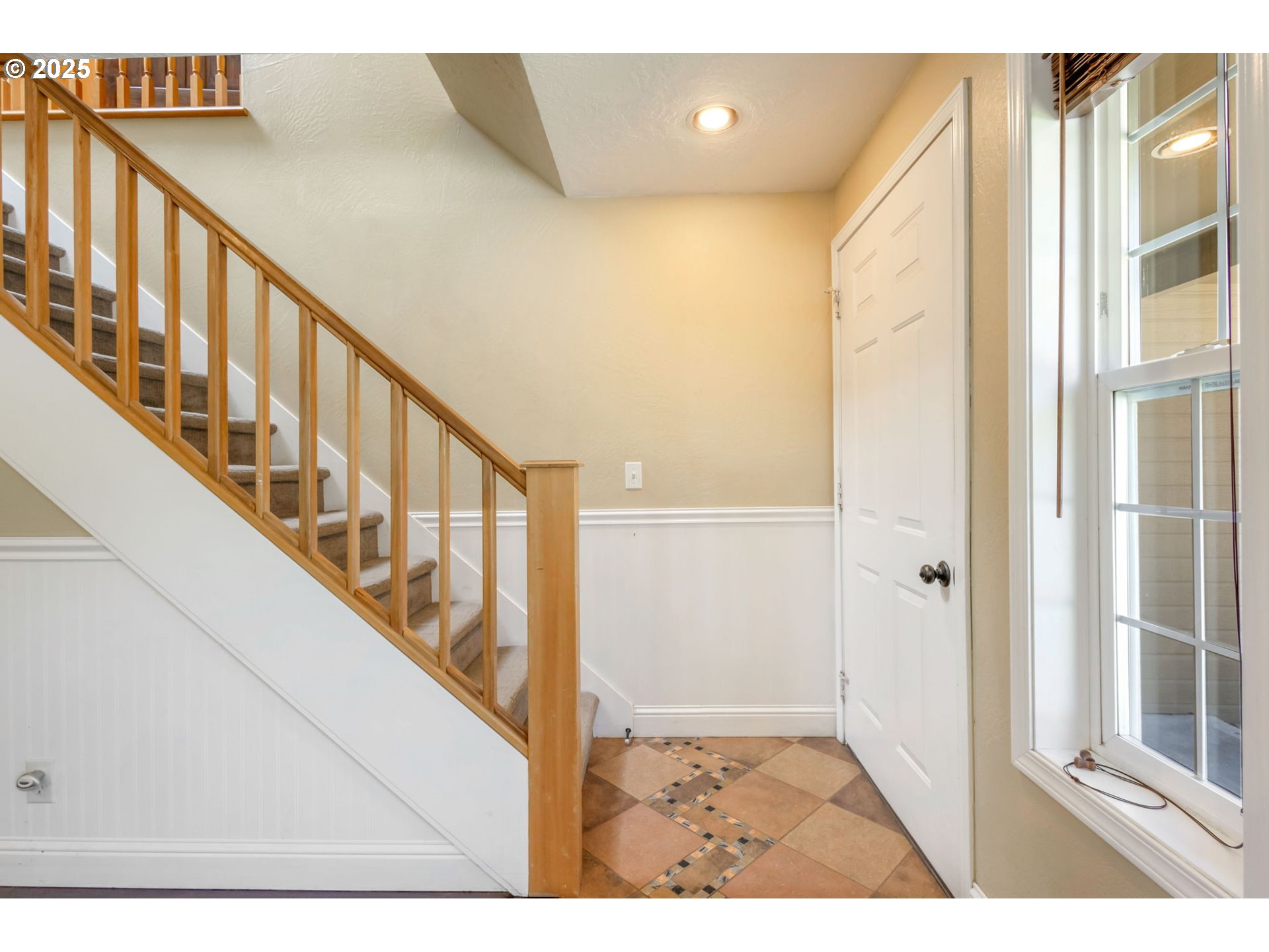 19723 Buck Canyon Road Bend, OR 97702 - Photo 4 of 48 a view of an entryway with wooden floor