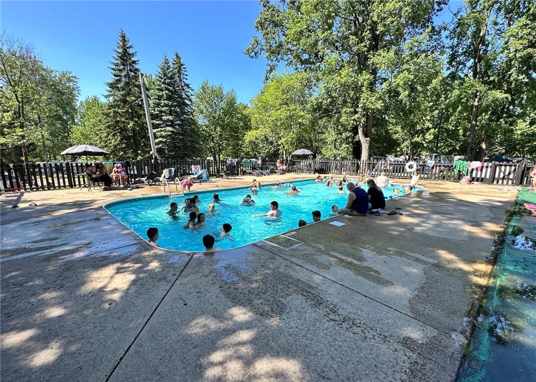 7150 Garner Road, Unit 40 Wolcott, NY 14590 - Photo 18 of 20 The HEATED POOL!