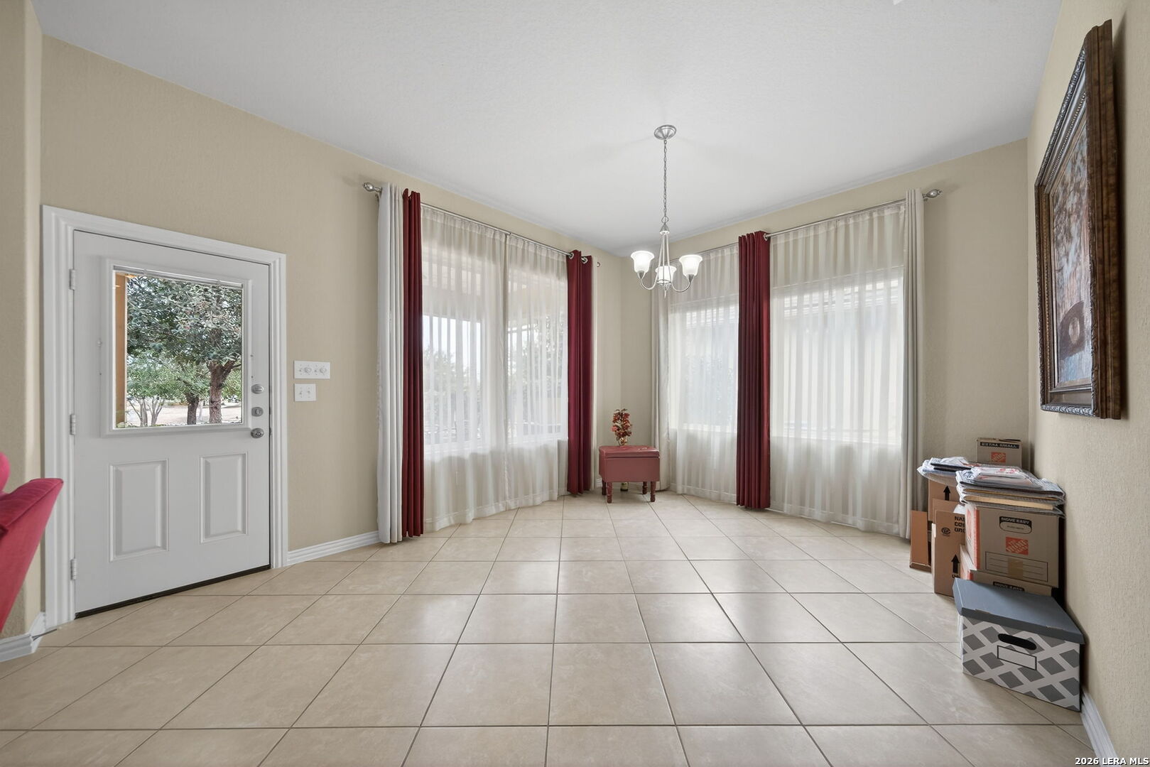 9108 Trail Stem Schertz, TX 78154 - Photo 12 of 26 a view of a livingroom with an empty space and a window