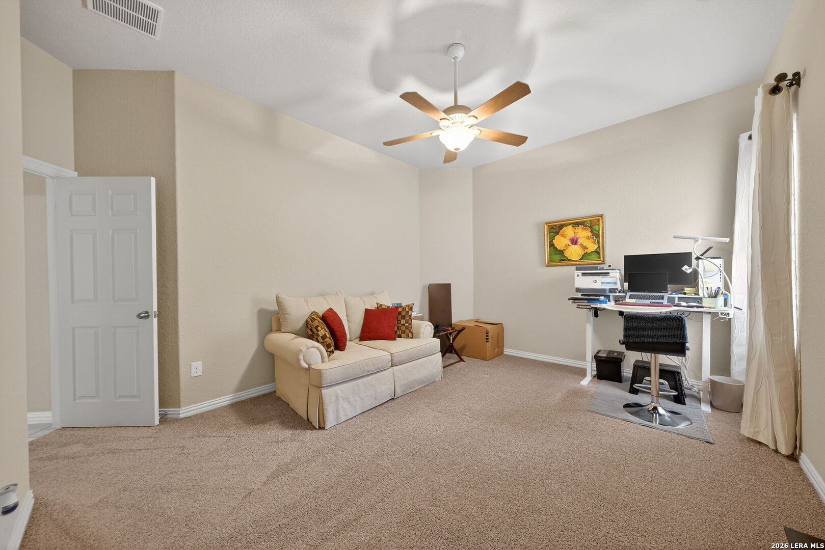 9108 Trail Stem Schertz, TX 78154 - Photo 24 of 26 a living room with furniture and a ceiling fan