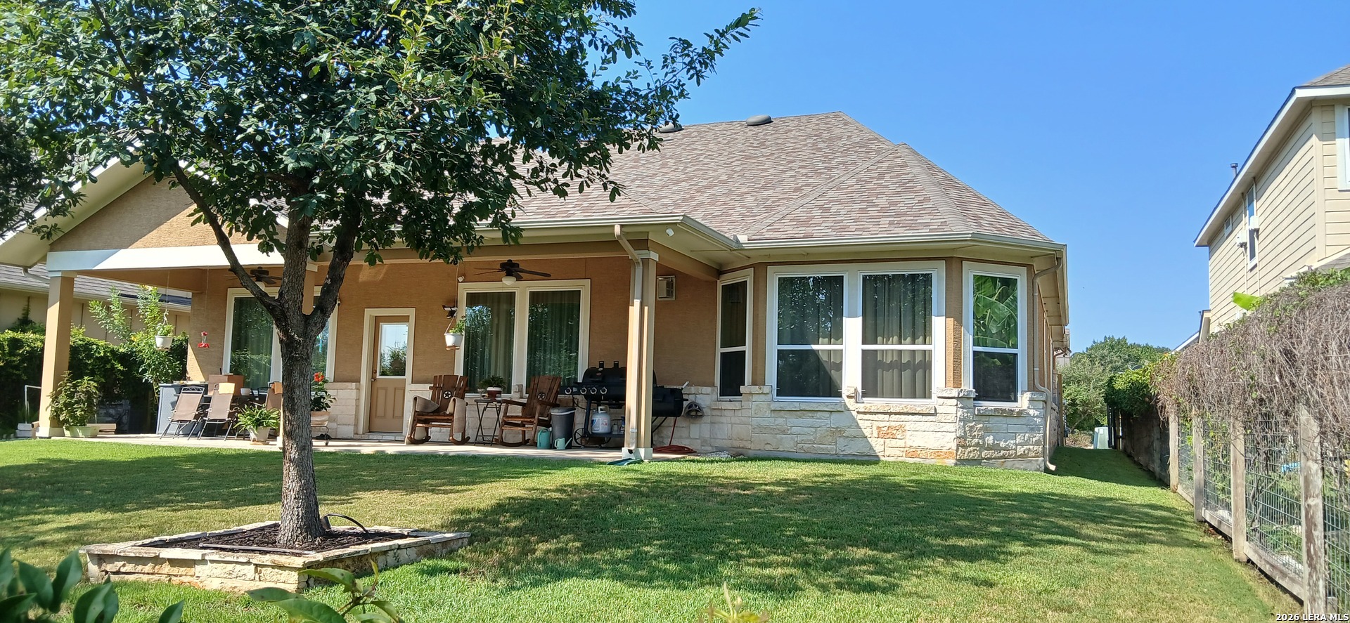 9108 Trail Stem Schertz, TX 78154 - Photo 4 of 26 a view of a house with garden and porch