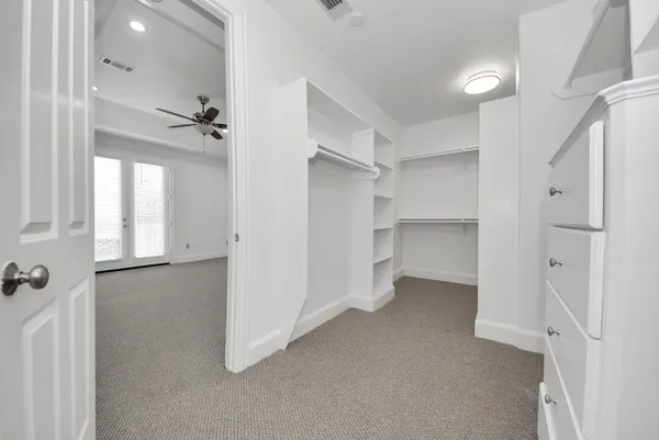 a view of a hallway with a closet