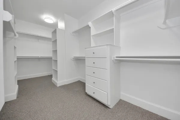a view of an empty walk in closet