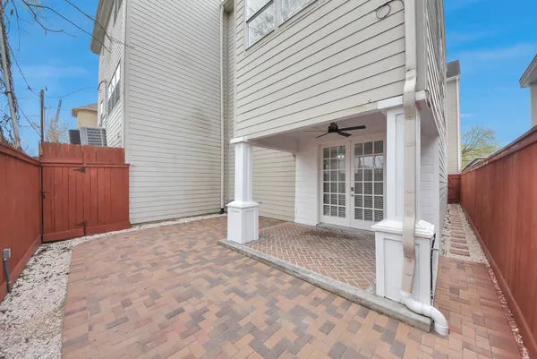 a view of house with backyard