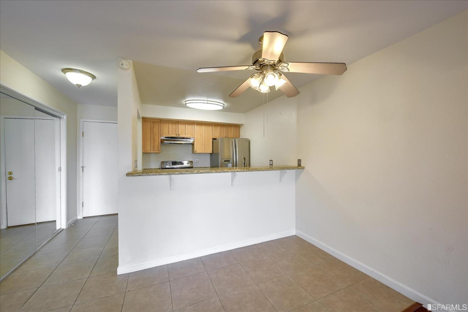 466 Crescent Street, Unit 310 Oakland, CA 94610 - Photo 14 of 24 wooden floor in an empty room with a window