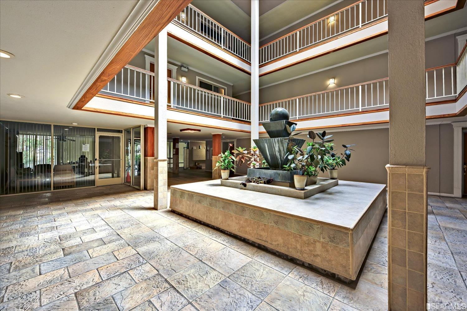 466 Crescent Street, Unit 310 Oakland, CA 94610 - Photo 22 of 24 a view of living room with a table and chairs