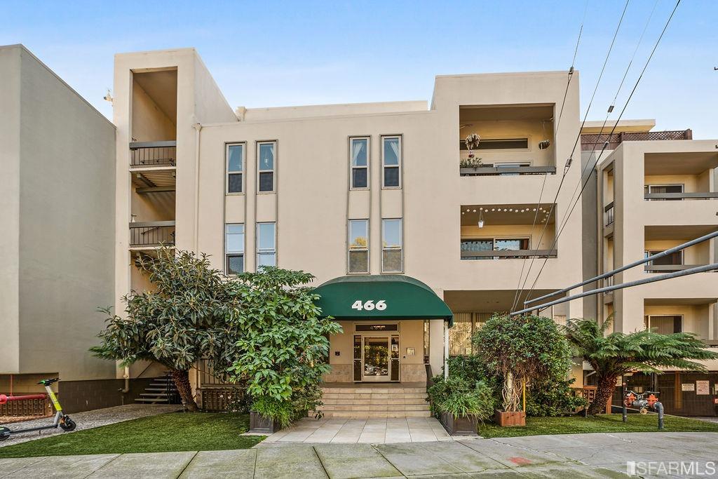 466 Crescent Street, Unit 310 Oakland, CA 94610 - Photo 24 of 24 a front view of a building with a garden