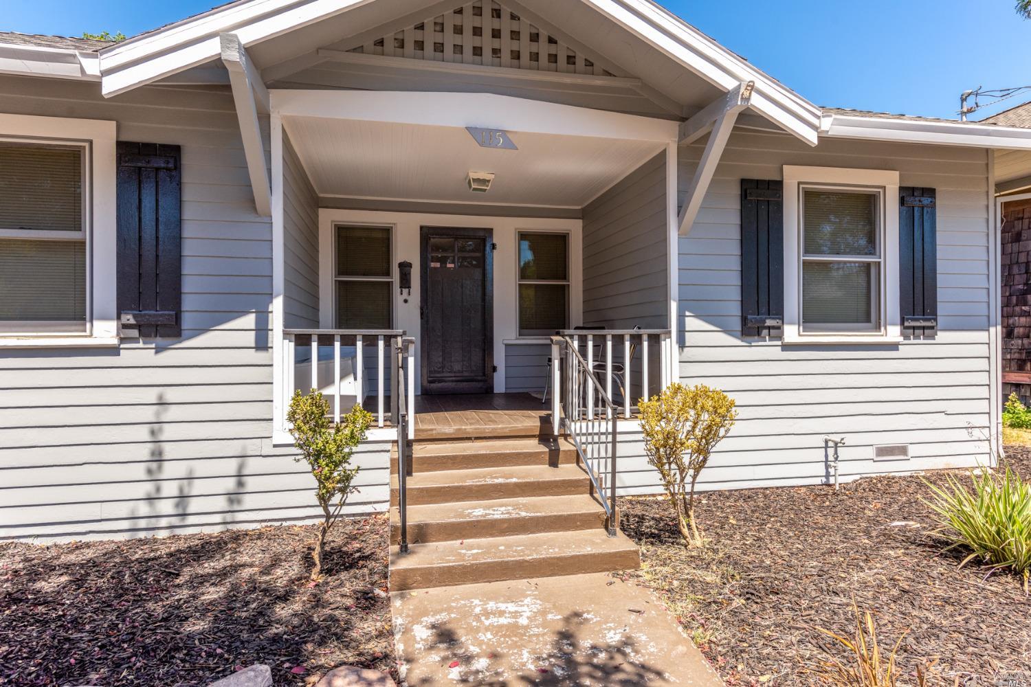 a front view of a house with a patio