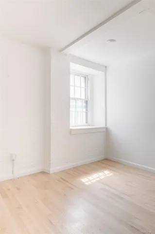 an empty room with a window