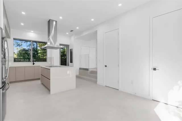 a view of a hallway with stairs