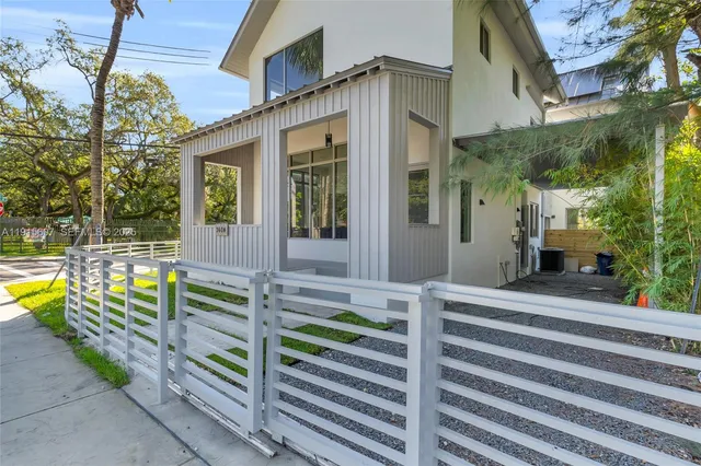 a front view of a house with outdoor space