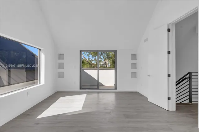 a view of an house with a trees