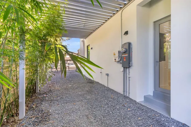 a view of a house with a street