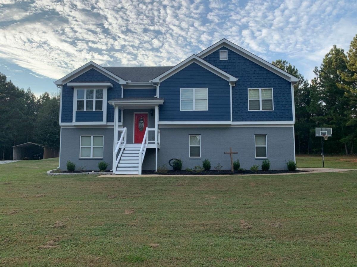 769 New Hope Church Road Comer, GA 30629 - Photo 1 of 1 a front view of a house with a yard