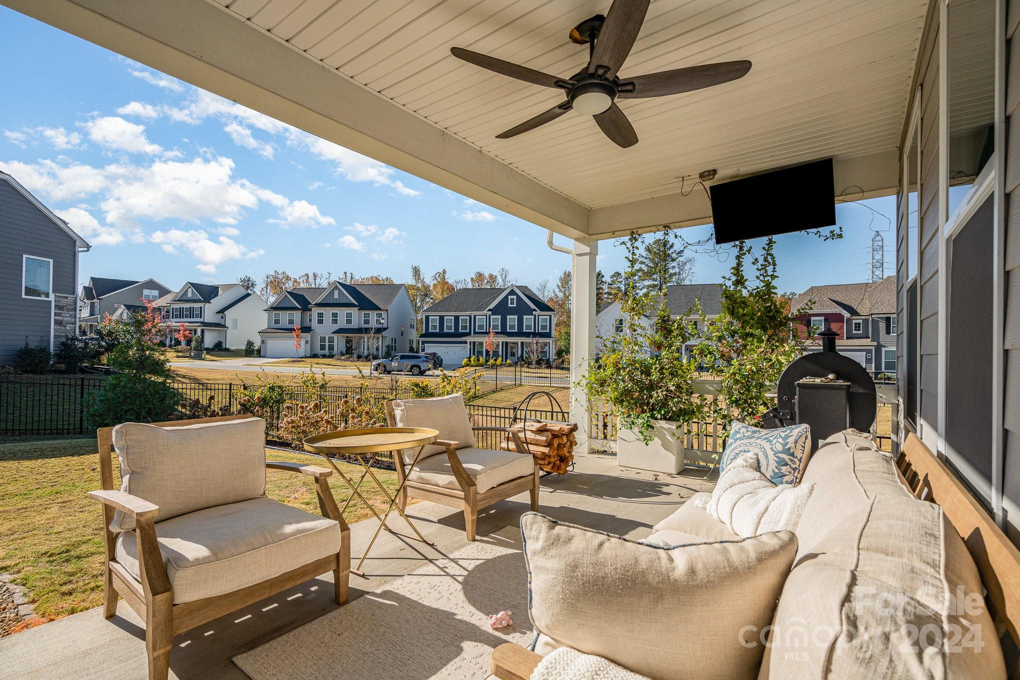 3063 Patchwork Court Fort Mill, SC 29708 - Photo 12 of 28 a outdoor space with patio the couches and a flat screen tv