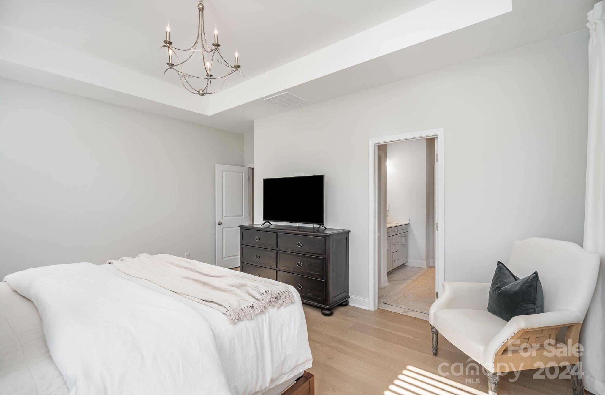 3063 Patchwork Court Fort Mill, SC 29708 - Photo 16 of 28 a bedroom with a bed and a television