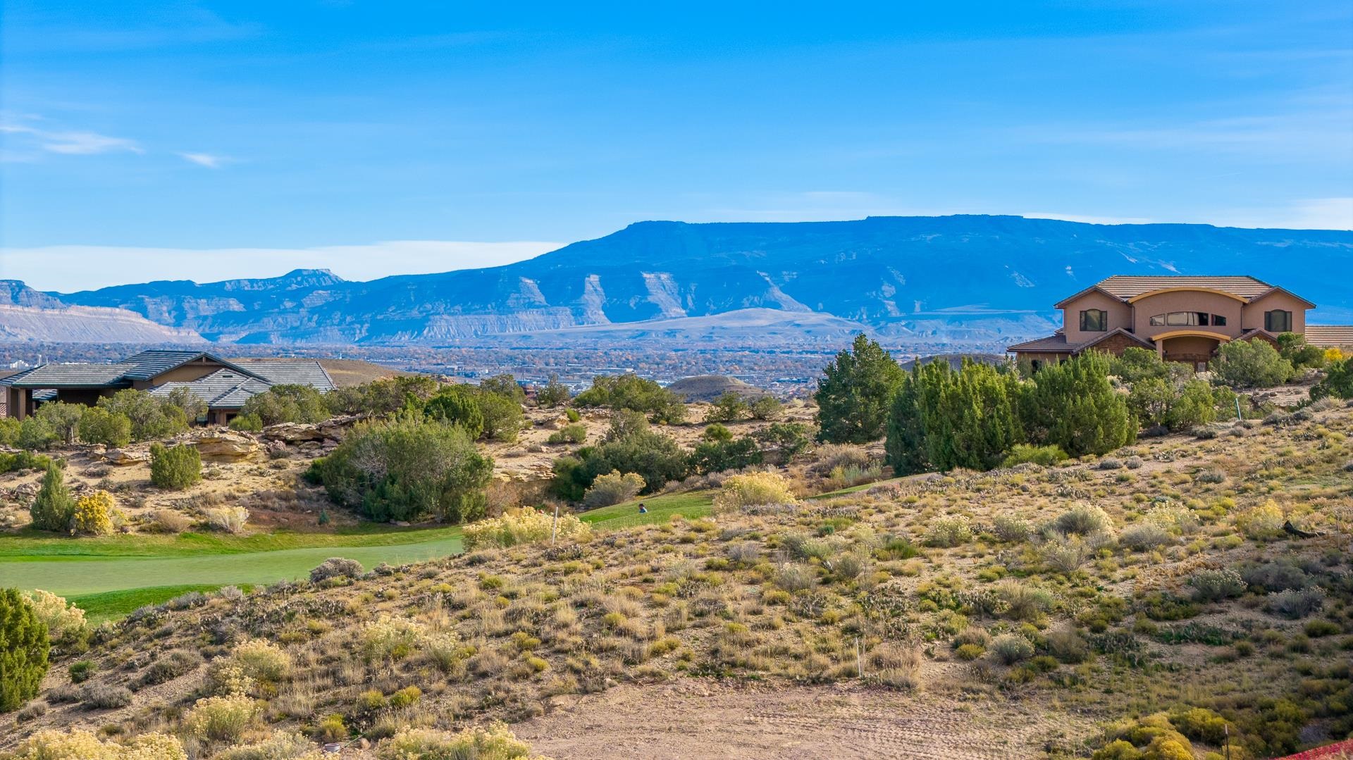 2304 West Ridges Boulevard Grand Junction, CO 81507 - Photo 10 of 13 a view of a house with a yard