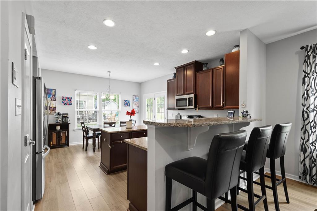 5018 Firwood Drive Canonsburg, PA 15317 - Photo 12 of 50 a kitchen with lots of counter top space and stainless steel appliances