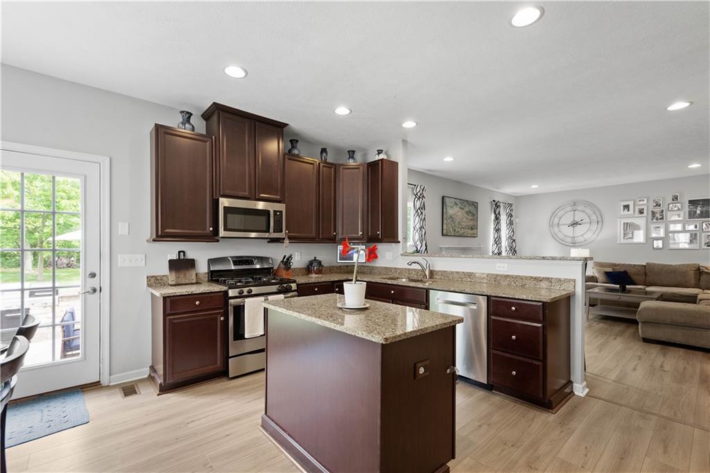 5018 Firwood Drive Canonsburg, PA 15317 - Photo 14 of 50 a kitchen with a stove sink and microwave