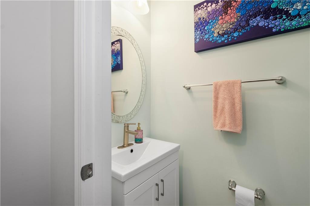 5018 Firwood Drive Canonsburg, PA 15317 - Photo 17 of 50 a bathroom with a sink and mirror