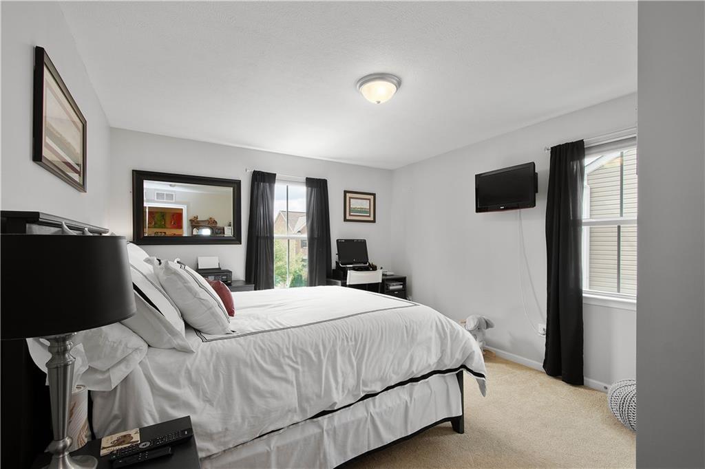 5018 Firwood Drive Canonsburg, PA 15317 - Photo 18 of 50 a bedroom with a bed and a flat screen tv