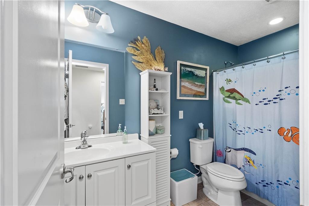 5018 Firwood Drive Canonsburg, PA 15317 - Photo 20 of 50 a bathroom with a double vanity sink toilet and shower