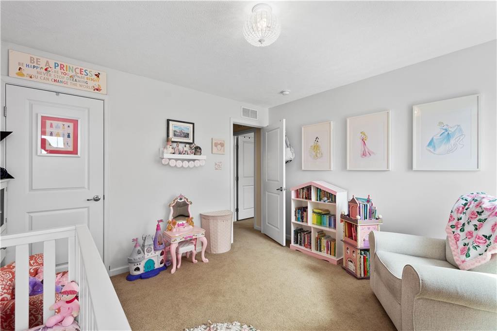 5018 Firwood Drive Canonsburg, PA 15317 - Photo 22 of 50 a children room with toys and a couch