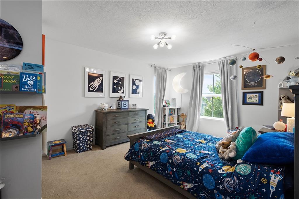 5018 Firwood Drive Canonsburg, PA 15317 - Photo 24 of 50 a bedroom with a bed and a window in it