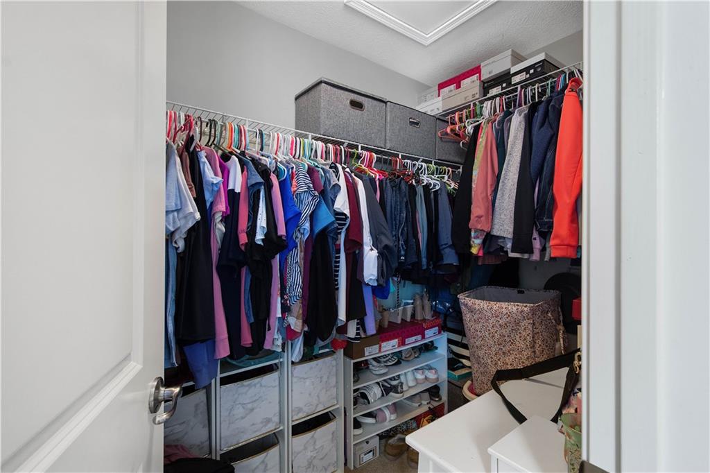 5018 Firwood Drive Canonsburg, PA 15317 - Photo 28 of 50 a view of walk in closet with clothes