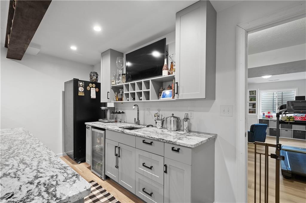 5018 Firwood Drive Canonsburg, PA 15317 - Photo 37 of 50 a kitchen with a sink and a refrigerator